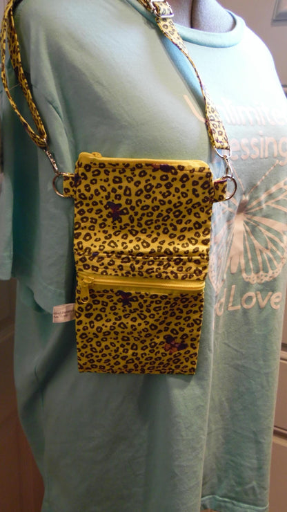 Cheetah Print Purse in Purple on a Yellow Background with Butterflies