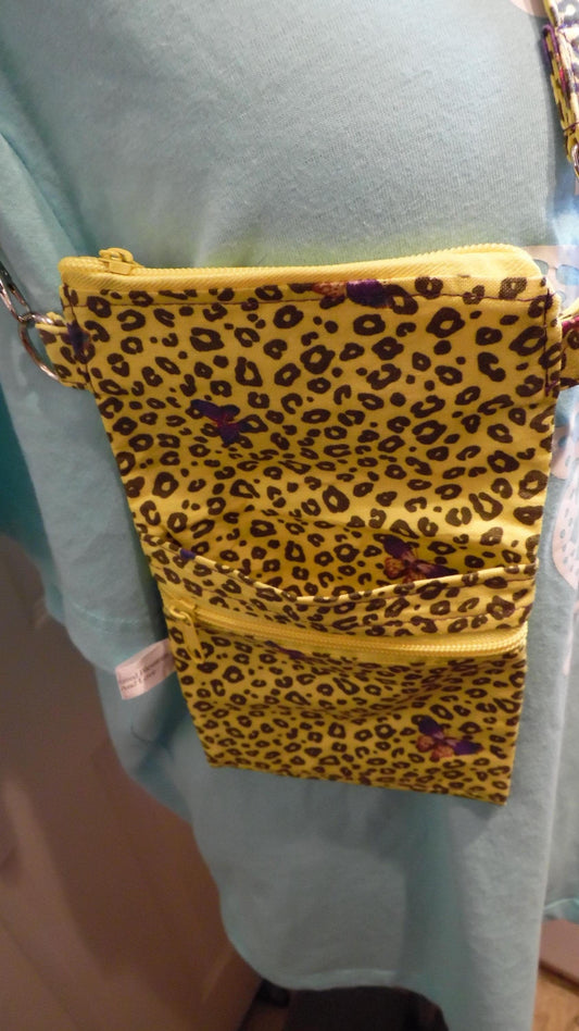 Cheetah Print Purse in Purple on a Yellow Background with Butterflies